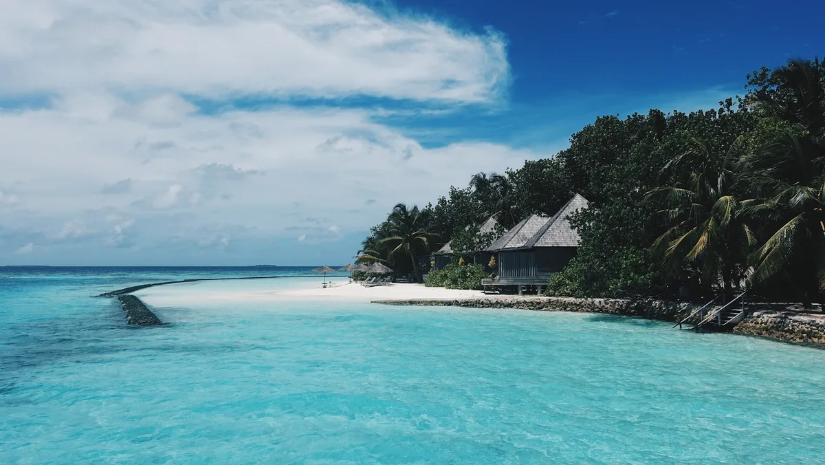 Lagon turquoise et îlot privé au large de l'île Maurice